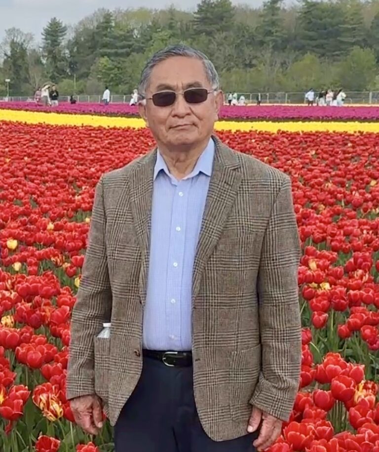 Photo of man in suit